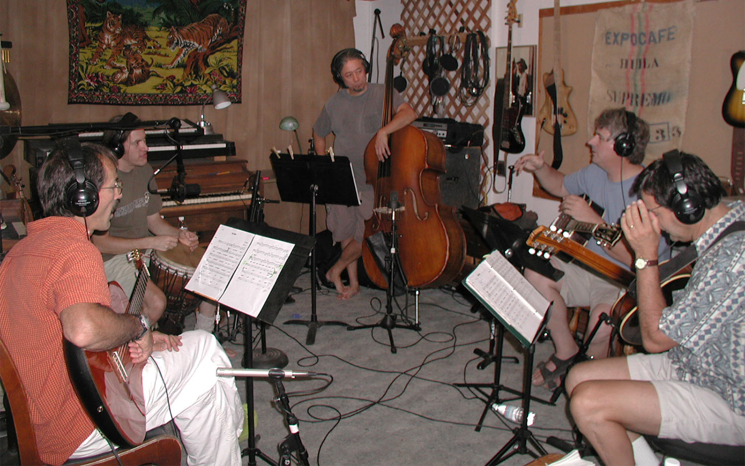 Group of musicians recording in a studio