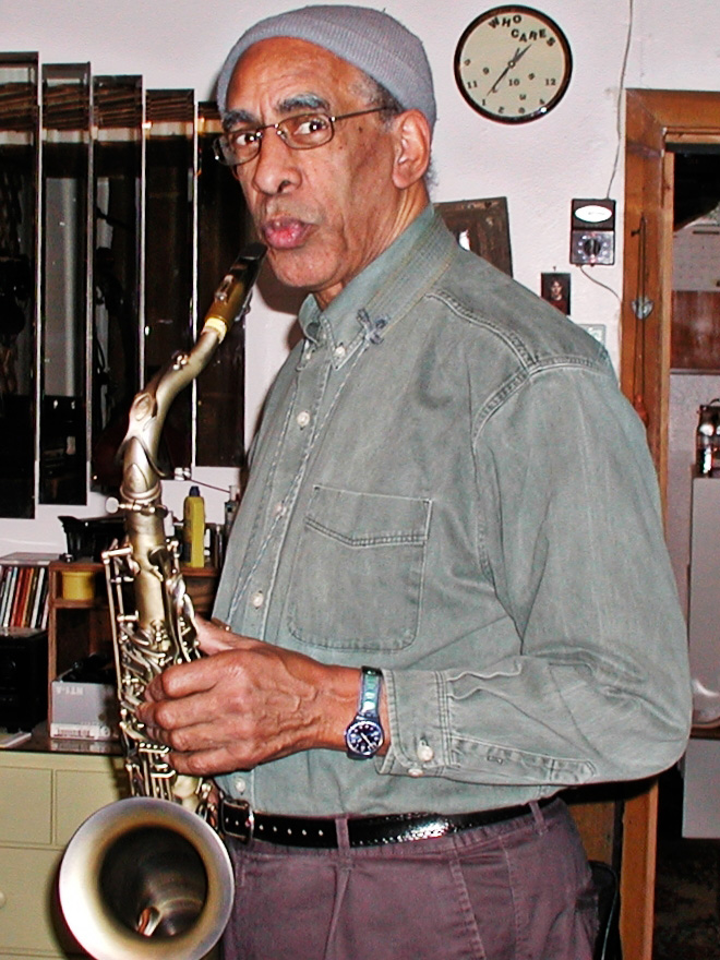 Man holding a saxaphone